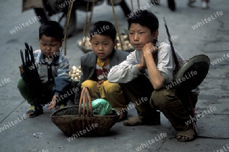 a young worker in the city of wushan on the yangzee river near the three gorges valley up of the three gorges dam project in the province of hubei in china.