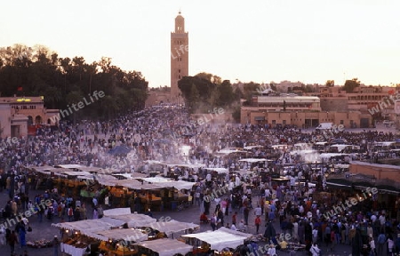 The Streetfood and Nightlife at the Djemma del Fna Square in the old town of Marrakesh in Morocco in North Africa.
