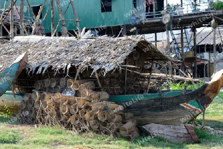 The People at wort in the Lake Village Kompong Pluk at the Lake Tonle Sap near the City of Siem Riep in the west of Cambodia.