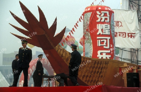 the army security on economy fair in the city Square of Chengdu in the provinz Sichuan in centrall China.