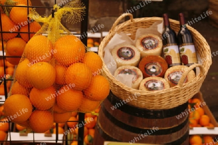 Orange and Wine at a Market in the  mountain Village of  Tejeda in the centre of the Canary Island of Spain in the Atlantic ocean.