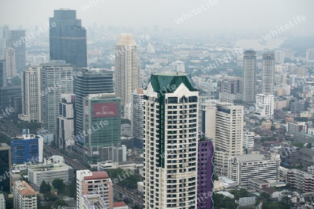 The Skyline view from the Sky Bar at the Riverside Aerea in the city of Bangkok in Thailand in Southeastasia.