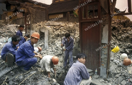  working people in the construction in the City of Shanghai in china in east asia. 