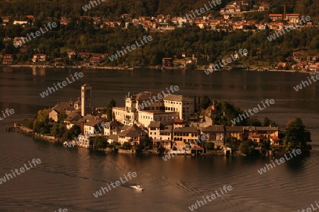 The Isla San Giulio in the Ortasee outside of the Fishingvillage of Orta on the Lake Orta in the Lombardia  in north Italy. 