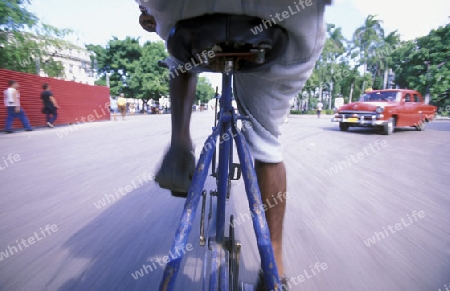 a bicycle Taxi in the old townl of the city of Havana on Cuba in the caribbean sea