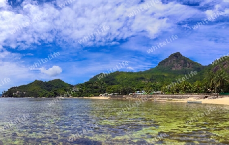 Stunning high resolution beach panorama taken on the paradise islands Seychelles.