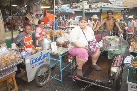 a People Transport at the morning Market in Nothaburi in the north of city of Bangkok in Thailand in Southeastasia.