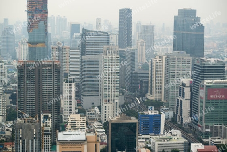 The Skyline view from the Sky Bar at the Riverside Aerea in the city of Bangkok in Thailand in Southeastasia.