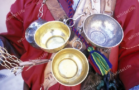 Traditional water seller at the Djemma del Fna Square in the old town of Marrakesh in Morocco in North Africa.
