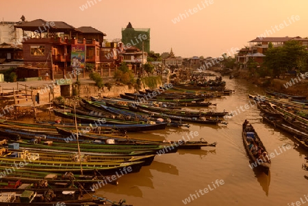 the Boat landing Pier at the Nan Chaung Main Canal in the city of Nyaungshwe at the Inle Lake in the Shan State in the east of Myanmar in Southeastasia.