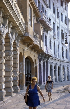 the Malecon road on the coast in the old townl of the city of Havana on Cuba in the caribbean sea