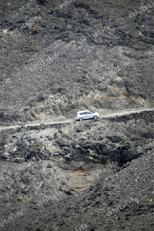 The Road in the Jandia Natural Parc on the south of the Island Fuerteventura on the Canary island of Spain in the Atlantic Ocean.