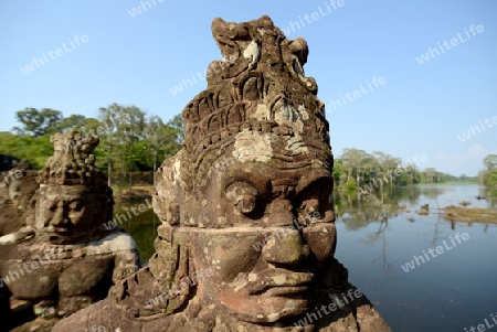 The Bridge at the Angkor Tom Gate in the Temple City of Angkor near the City of Siem Riep in the west of Cambodia.