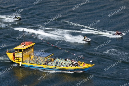 a boat on the Douro River in Ribeira in the city centre of Porto in Porugal in Europe.