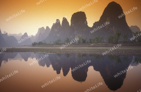 the landscape at the Li River near Yangshou near the city of  Guilin in the Province of Guangxi in china in east asia. 