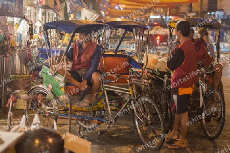 Bicycle Ricksha Taxis at the morning Market in Nothaburi in the north of city of Bangkok in Thailand in Southeastasia.