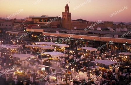 The Streetfood and Nightlife at the Djemma del Fna Square in the old town of Marrakesh in Morocco in North Africa.
