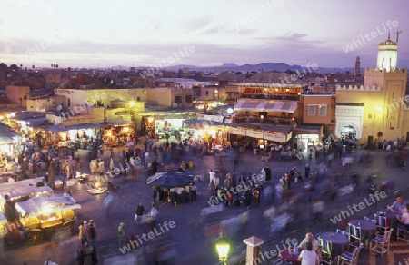 The Streetfood and Nightlife at the Djemma del Fna Square in the old town of Marrakesh in Morocco in North Africa.
