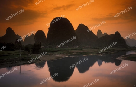 the landscape at the Li River near Yangshou near the city of  Guilin in the Province of Guangxi in china in east asia. 