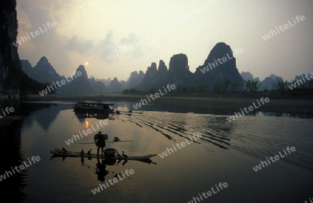 the landscape at the Li River near Yangshou near the city of  Guilin in the Province of Guangxi in china in east asia. 