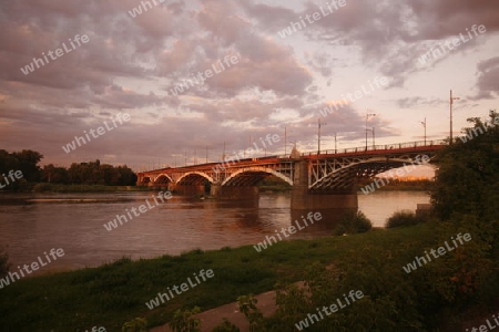 A Bridge and the Wistla River in the City of Warsaw in Poland, East Europe.