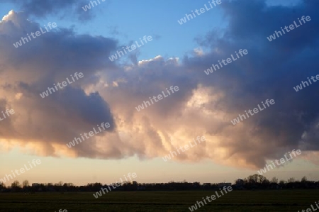 Fields under clouds