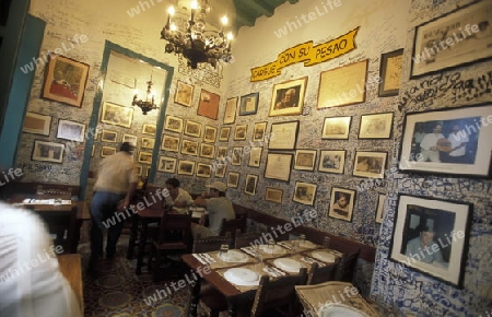 the Bar La Bodeguita del medio in the city of Havana on Cuba in the caribbean sea.