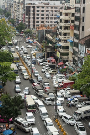 a road in the china town in the City of Yangon in Myanmar in Southeastasia.