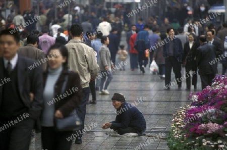 People at the main square in the city of Chongqing in the province of Sichuan in china in east asia. 