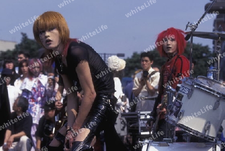 a Japanese Youth Punk Band plays on a square in the City of Tokyo in Japan in Asia,



