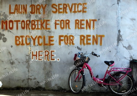 Ein Fahrrad Vermieter in der Bergregion der Nationalstrasse 13 zwischen Vang Vieng und Luang Prabang in Zentrallaos von Laos in Suedostasien. 