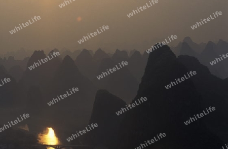 the landscape at the Li River near Yangshou near the city of  Guilin in the Province of Guangxi in china in east asia. 