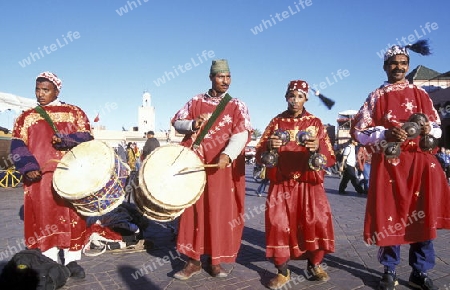 Traditional Music player at the Djemma del Fna Square in the old town of Marrakesh in Morocco in North Africa.
