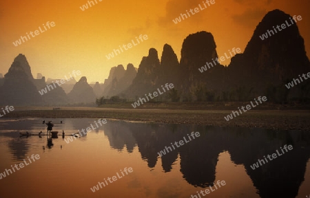 the landscape at the Li River near Yangshou near the city of  Guilin in the Province of Guangxi in china in east asia. 