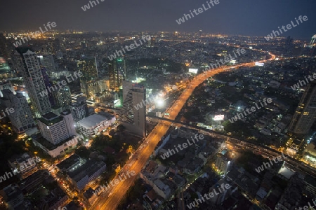 The Skyline view from the Sky Bar at the Riverside Aerea in the city of Bangkok in Thailand in Southeastasia.