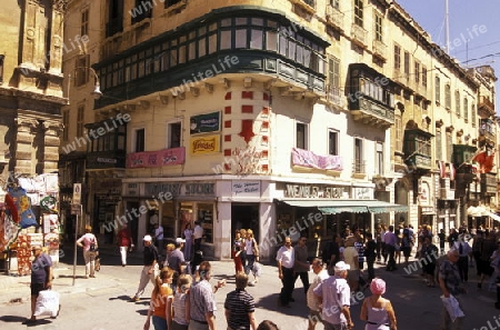 A smal road in the centre of the Old Town of the city of Valletta on the Island of Malta in the Mediterranean Sea in Europe.
