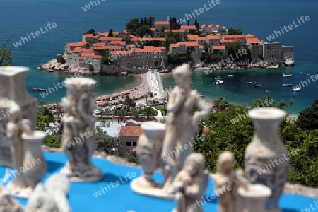 Die Altstadtinsel von Sveti Stefan in der Adria an der Kueste in Montenegro im Balkan am Mittelmeer in Europa.