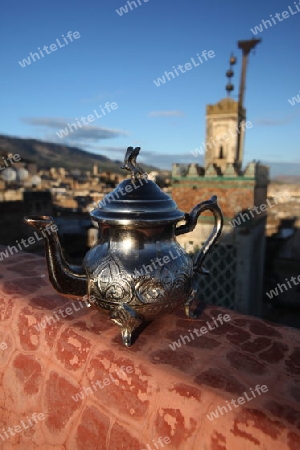 A Minttea in a teahouse in the old City in the historical Town of Fes in Morocco in north Africa.