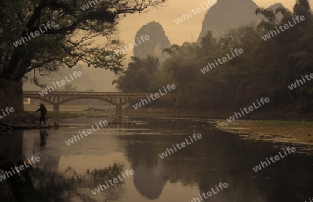 the landscape at the Li River near Yangshou near the city of  Guilin in the Province of Guangxi in china in east asia. 