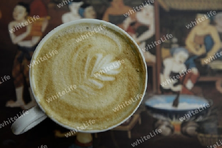 a coffee in a coffee shop in the town of Nyaungshwe at the Inle Lake in the Shan State in the east of Myanmar in Southeastasia.