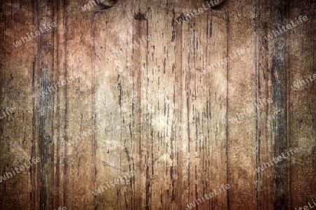 Old and weathered vintage wooden plank background with scratches 