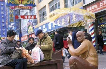 the Nanjing Dong Lu road in the City of Shanghai in china in east asia. 