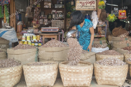 a shop at a marketstreet in the City of Mandalay in Myanmar in Southeastasia.