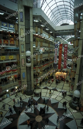 a shopping centre in the city of Canton or Guangzhou in the north of Hongkong in the province of Guangdong in china in east asia. 