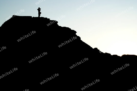 Fotograf auf Felsen