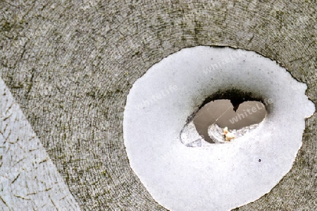 Detailed close up of bullet holes from gun shots in a german traffic sign