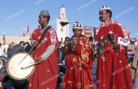 Traditional Music player at the Djemma del Fna Square in the old town of Marrakesh in Morocco in North Africa.
