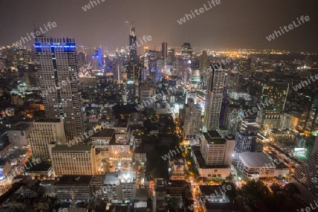 The Skyline view from the Sky Bar at the Riverside Aerea in the city of Bangkok in Thailand in Southeastasia.