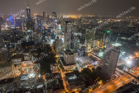 The Skyline view from the Sky Bar at the Riverside Aerea in the city of Bangkok in Thailand in Southeastasia.