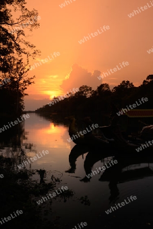 The River at the Bridge of Angkor Thom in the Temple City of Angkor near the City of Siem Riep in the west of Cambodia.